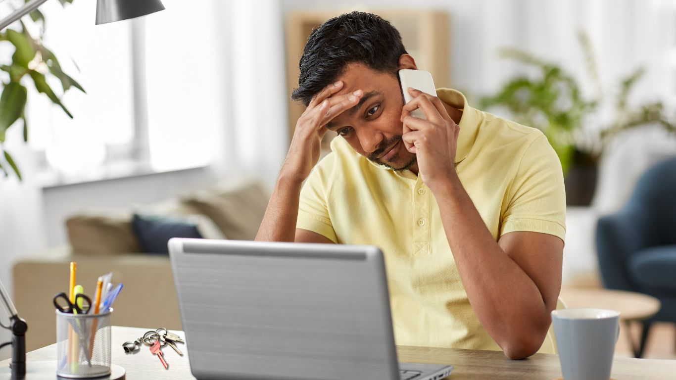 A homeowner reviewing their insurance policy after a lock was damaged.