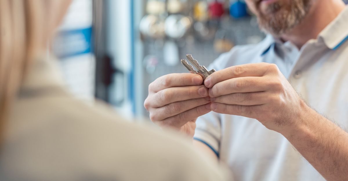 a locksmith inspecting keys